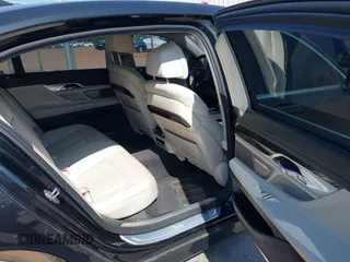 2016 BMW 7 Series 740i with VIN WBA7E2C55GG547752, listed as a IAAI auction lot 41992704 with Not Provided miles and . Bid and sale history available at carsss.com. Image 8.