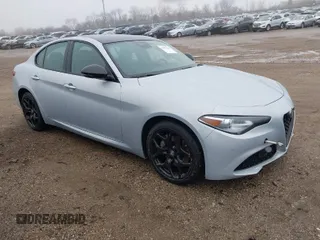2021 Alfa Romeo Giulia with VIN ZARFANAN9M7643819, listed as a IAAI auction lot 41477128 with 29,411 mi miles. Bid and sale history available at carsss.com. Image 1.