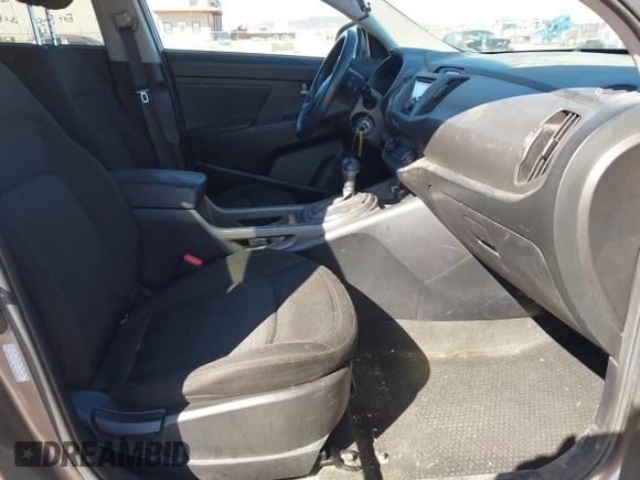 2012 Kia Sportage LX with VIN KNDPBCA27C7318056, listed as a IAAI auction lot 41887312 with 144,940 mi miles and . Bid and sale history available at DreamBid. Image 5.