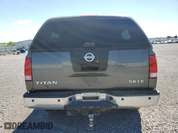 2005 Nissan Titan LE with VIN 1N6BA07B95N571880, listed as a Copart auction lot 57527435 with 199,577 mi miles and Salvage title. Bid and sale history available at DreamBid. Image 6.