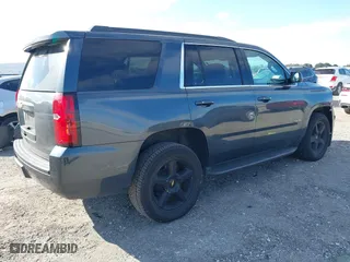 2020 Chevrolet Tahoe LT with VIN 1GNSCBKC4LR246060, listed as a IAAI auction lot 41272902 with 105,417 mi miles. Bid and sale history available at carsss.com. Image 4.