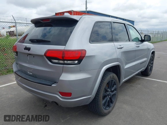 2017 Jeep Grand Cherokee Laredo with VIN 1C4RJFAG1HC701921, listed as a IAAI auction lot 42164963 with 135,039 mi miles and . Bid and sale history available at DreamBid. Image 4.