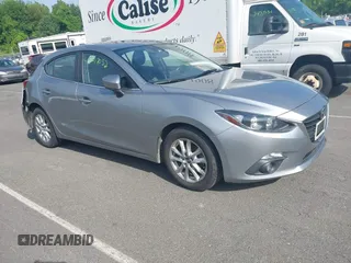 2016 Mazda 3 i Grand Touring with VIN 3MZBM1N79GM263116, listed as a IAAI auction lot 42417032 with 87,923 mi miles and . Bid and sale history available at DreamBid. Image 1.