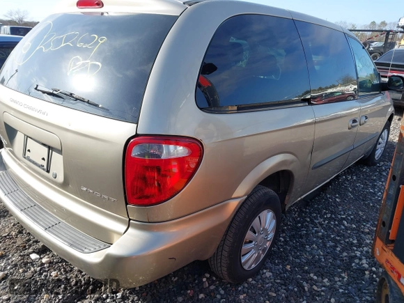 2003 Dodge Caravan Sport with VIN 2D4GP44R13R274458, listed as a IAAI auction lot 41788865 with 999,999 mi miles. Bid and sale history available at carsss.com. Image 4.