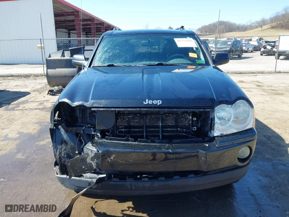2007 Jeep Grand Cherokee Laredo with VIN 1J8GR48K67C523705, listed as a IAAI auction lot 41774281 with 215,572 mi miles. Bid and sale history available at carsss.com. Image 13.