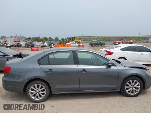 2012 Volkswagen Jetta SE z VIN 3VWDP7AJ2CM009780, wystawiony jako IAAI lot #42501489 z przebiegiem 122 185 mil mil oraz . Historia ofert i sprzedaży dostępna na DreamBid. Obrazek 12.