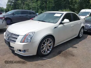 2011 Cadillac CTS Premium with VIN 1G6DP5ED2B0113072, listed as a IAAI auction lot 42797153 with 171,779 mi miles and . Bid and sale history available at DreamBid. Image 2.