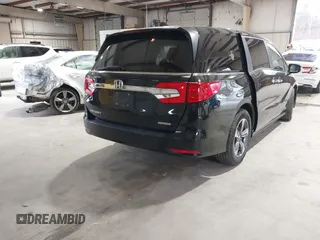 2018 Honda Odyssey Touring with VIN 5FNRL6H87JB105410, listed as a IAAI auction lot 41860707 with 91,908 mi miles. Bid and sale history available at carsss.com. Image 4.