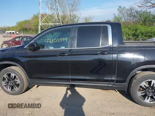 2020 Honda Ridgeline RTL with VIN 5FPYK3F52LB024816, listed as a IAAI auction lot 42103344 with 68,700 mi miles and . Bid and sale history available at DreamBid. Image 14.