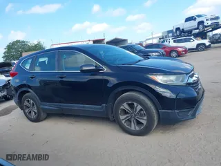 2017 Honda CR-V LX with VIN 7FARW5H33HE001050, listed as a IAAI auction lot 41944571 with 61,159 mi miles. Bid and sale history available at carsss.com. Image 13.