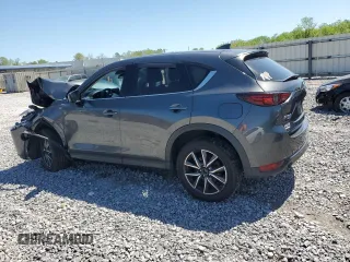 2018 Mazda CX-5 Grand Touring z VIN JM3KFBDM3J0351106, wystawiony jako Copart lot #52553925 z przebiegiem Nie podano mil oraz Szkoda całkowita • Salvage title. Historia ofert i sprzedaży dostępna na DreamBid. Obrazek 2.