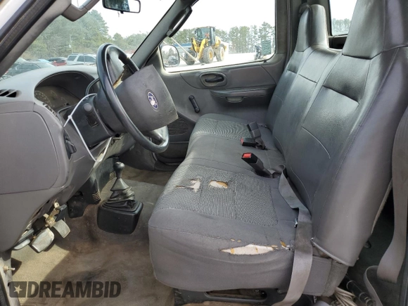 2003 Ford F-150 XL z VIN 1FTRF18W53NB45997, wystawiony jako Copart lot #42451525 z przebiegiem 149 166 mil mil oraz Szkoda całkowita • Salvage title. Historia ofert i sprzedaży dostępna na DreamBid. Obrazek 7.