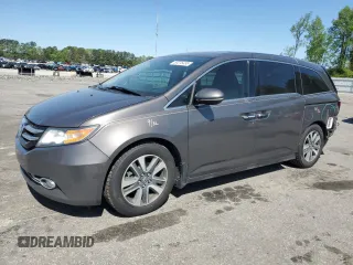 2016 Honda Odyssey Touring Elite with VIN 5FNRL5H91GB088163, listed as a Copart auction lot 50276495 with 197,274 mi miles and Salvage Title. Bid and sale history available at DreamBid. Image 1.