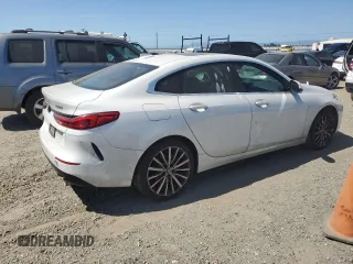 2020 BMW 2 Series 228i xDrive with VIN WBA73AK02L7F72756, listed as a Copart auction lot 59174455 with 60,415 mi miles and Salvage title. Bid and sale history available at DreamBid. Image 3.
