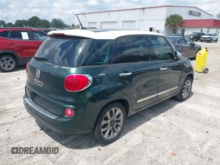 2014 FIAT 500L Lounge z VIN ZFBCFACH7EZ023283, wystawiony jako IAAI lot #42319623 z przebiegiem 129 414 mil mil oraz . Historia ofert i sprzedaży dostępna na DreamBid. Obrazek 4.