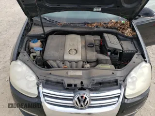 2009 Volkswagen Jetta SE z VIN 3VWRM71K89M141488, wystawiony jako Copart lot #43658055 z przebiegiem Nie podano mil oraz Czysty tytuł • Clean title. Historia ofert i sprzedaży dostępna na DreamBid. Obrazek 11.