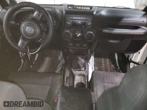 2012 Jeep Wrangler Sport z VIN 1C4AJWAG7CL256428, wystawiony jako Copart lot #66923465 z przebiegiem 36 478 mil mil oraz Szkoda całkowita • Salvage title. Historia ofert i sprzedaży dostępna na DreamBid. Obrazek 8.