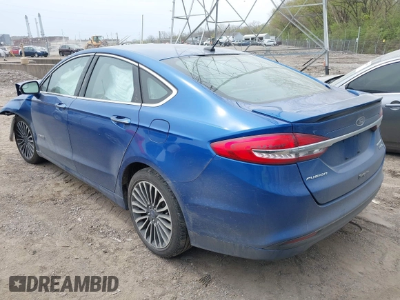 2017 Ford Fusion Hybrid Titanium с VIN 3FA6P0RU5HR388615, выставлен на аукционе IAAI как лот 42066142 с пробегом 121 618 миль миль и . История ставок и продаж доступна на DreamBid. Изображение 3.