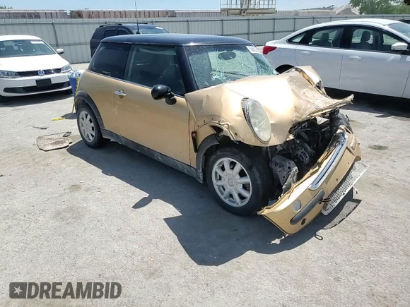 2004 MINI Hardtop z VIN WMWRC33454TC50742, wystawiony jako Copart lot #56655565 z przebiegiem Nie podano mil oraz Szkoda całkowita • Salvage title. Historia ofert i sprzedaży dostępna na DreamBid. Obrazek 14.
