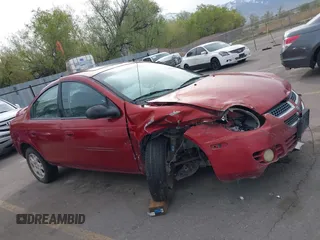 2004 Dodge Neon SXT with VIN 1B3ES56C04D504384, listed as a IAAI auction lot 41988581 with 166,602 mi miles. Bid and sale history available at carsss.com. Image 14.