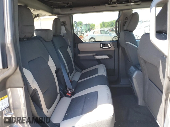 2023 Ford Bronco with VIN 1FMEE5DP6PLB66975, listed as a Copart auction lot 57536014 with 11,883 mi miles and Salvage Title. Bid and sale history available at DreamBid. Image 11.