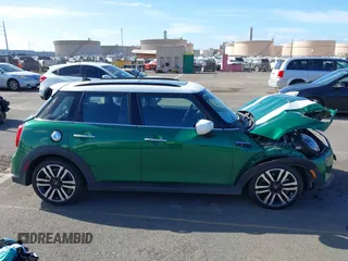 2022 MINI Hardtop 4 Door Cooper S z VIN WMW53DK0XN2R31678, wystawiony jako IAAI lot #41859367 z przebiegiem Nie podano mil oraz . Historia ofert i sprzedaży dostępna na DreamBid. Obrazek 14.