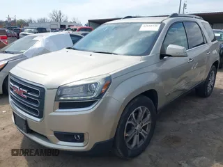 2015 GMC Acadia SLT with VIN 1GKKVRKD4FJ338331, listed as a IAAI auction lot 42030330 with 164,748 mi miles and . Bid and sale history available at carsss.com. Image 2.