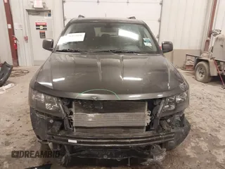 2020 Dodge Journey SE Value with VIN 3C4PDCAB7LT261279, listed as a IAAI auction lot 41564096 with 67,388 mi miles and . Bid and sale history available at DreamBid. Image 12.