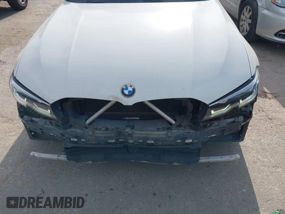 2019 BMW 3 Series 330i with VIN WBA5R1C53KAK08179, listed as a IAAI auction lot 42010397 with 71,975 mi miles and . Bid and sale history available at DreamBid. Image 6.