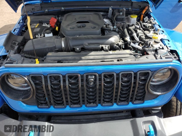 2024 Jeep Wrangler Sahara with VIN 1C4RJXP60RW163829, listed as a Copart auction lot 57182365 with 16,873 mi miles and Salvage title. Bid and sale history available at DreamBid. Image 12.