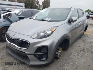 2021 Kia Sportage LX with VIN KNDPM3AC2M7931660, listed as a IAAI auction lot 41924609 with 55,512 mi miles. Bid and sale history available at carsss.com. Image 20.