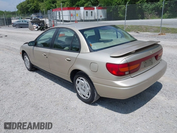 2001 Saturn SL z VIN 1G8ZK54721Z272773, wystawiony jako IAAI lot #42449133 z przebiegiem 56 714 mil mil oraz . Historia ofert i sprzedaży dostępna na DreamBid. Obrazek 3.
