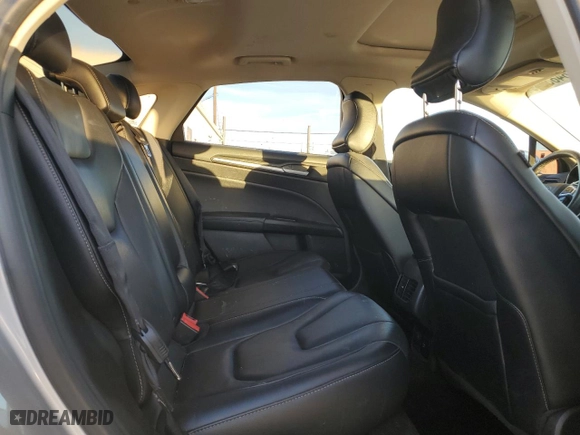 2017 Ford Fusion Energi Titanium with VIN 3FA6P0SUXHR379807, listed as a Copart auction lot 84885494 with 100,735 mi miles and Salvage Title. Bid and sale history available at carsss.com. Image 10.
