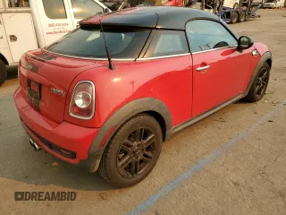 2012 MINI Coupe S z VIN WMWSX3C57CT155013, wystawiony jako Copart lot #88066275 z przebiegiem 69 870 mil mil oraz Szkody całkowita. Historia ofert i sprzedaży dostępna na DreamBid. Obrazek 3.