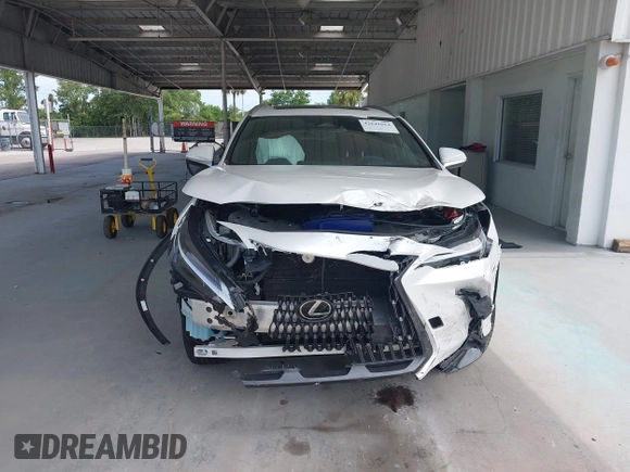 2023 Lexus NX 350h Premium z VIN 2T2GKCEZ2PC010333, wystawiony jako IAAI lot #42641664 z przebiegiem 35 369 mil mil oraz . Historia ofert i sprzedaży dostępna na DreamBid. Obrazek 13.