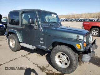 2003 Jeep Wrangler Sahara z VIN 1J4FA59SX3P302622, wystawiony jako Copart lot #52756105 z przebiegiem 181 900 mil mil oraz Szkoda całkowita • Salvage title. Historia ofert i sprzedaży dostępna na DreamBid. Obrazek 4.