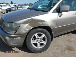 1999 Lexus RX 300 with VIN JT6HF10U6X0092078, listed as a IAAI auction lot 41988259 with 144,148 mi miles and . Bid and sale history available at DreamBid. Image 6.