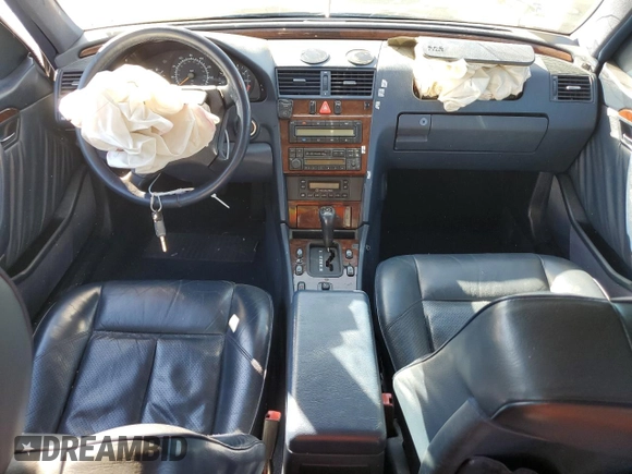 1996 Mercedes-Benz C with VIN WDBHA28E5TF406948, listed as a Copart auction lot 80234944 with 239,256 mi miles and Salvage Title. Bid and sale history available at carsss.com. Image 8.