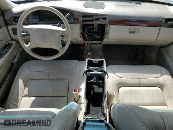 1999 Cadillac DeVille z VIN 1G6KD54YXXU794473, wystawiony jako Copart lot #79774804 z przebiegiem 44 601 mil mil oraz Czysty tytuł • Clean title. Historia ofert i sprzedaży dostępna na DreamBid. Obrazek 8.