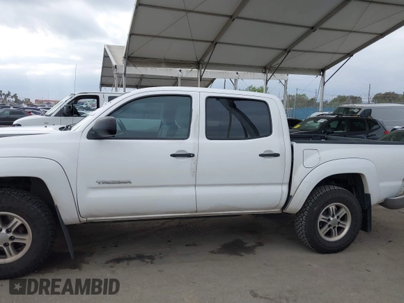 2011 Toyota Tacoma with VIN 5TFJX4GN7BX001567, listed as a IAAI auction lot 42066703 with 199,807 mi miles and . Bid and sale history available at DreamBid. Image 14.