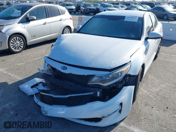 2016 Kia Optima LX with VIN 5XXGT4L33GG014082, listed as a IAAI auction lot 41870030 with 137,849 mi miles and . Bid and sale history available at DreamBid. Image 16.
