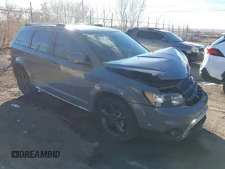 2019 Dodge Journey Crossroad with VIN 3C4PDCGG9KT857575, listed as a IAAI auction lot 41290197 with 91,051 mi miles and . Bid and sale history available at DreamBid. Image 1.