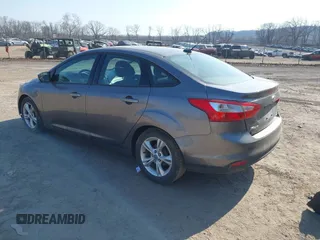 2014 Ford Focus SE with VIN 1FADP3F2XEL170580, listed as a IAAI auction lot 41752699 with 102,666 mi miles. Bid and sale history available at carsss.com. Image 3.