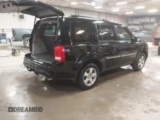 2012 Honda Pilot Touring with VIN 5FNYF4H91CB067014, listed as a IAAI auction lot 41749402 with 151,248 mi miles. Bid and sale history available at carsss.com. Image 4.