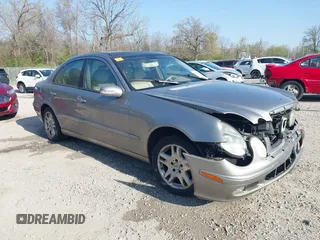 2003 Mercedes-Benz E-Class 3.2L with VIN WDBUF65J93X099223, listed as a IAAI auction lot 42033473 with 230,758 mi miles. Bid and sale history available at carsss.com. Image 1.