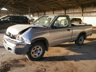 2000 Nissan Frontier XE z VIN 1N6DD21S5YC340513, wystawiony jako Copart lot #89018755 z przebiegiem 237 418 mil mil oraz Szkody całkowita. Historia ofert i sprzedaży dostępna na DreamBid. Obrazek 1.