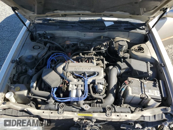 1992 Nissan Maxima z VIN JN1HJ01P6NT623546, wystawiony jako Copart lot #78095314 z przebiegiem 104 718 mil mil oraz Szkoda całkowita • Salvage title. Historia ofert i sprzedaży dostępna na DreamBid. Obrazek 11.