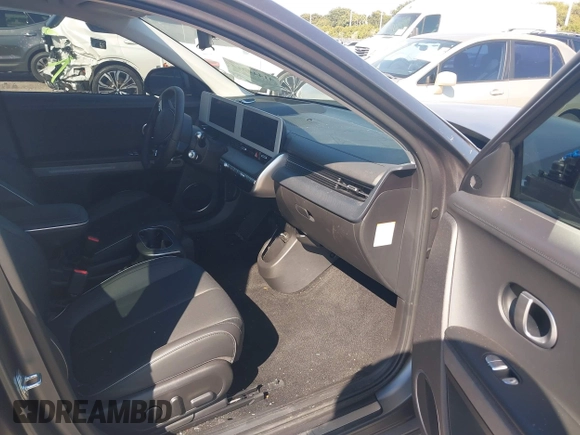 2024 Hyundai Ioniq 5 Limited z VIN KM8KR4DE2RU253057, wystawiony jako IAAI lot #41444014 z przebiegiem 6 185 mil mil oraz . Historia ofert i sprzedaży dostępna na DreamBid. Obrazek 5.