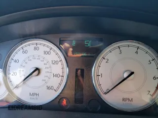 2005 Chrysler 300 300C AWD z VIN 2C3AK63H65H671814, wystawiony jako Copart lot #82867974 z przebiegiem 153 186 mil mil oraz Nie do naprawy. Historia ofert i sprzedaży dostępna na DreamBid. Obrazek 9.