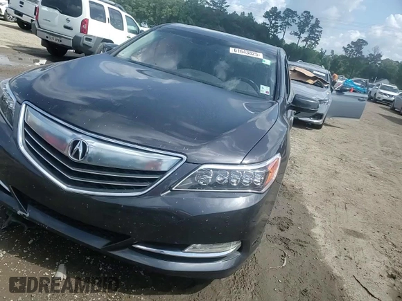 2014 Acura RLX Advance with VIN JH4KC1F93EC004320, listed as a Copart auction lot 61643825 with 80,123 mi miles and Salvage title. Bid and sale history available at DreamBid. Image 13.